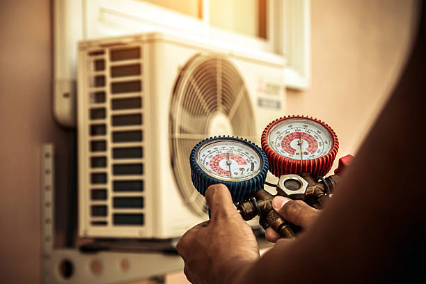 Professional Air Conditioning Service technician working in Fulton, TX